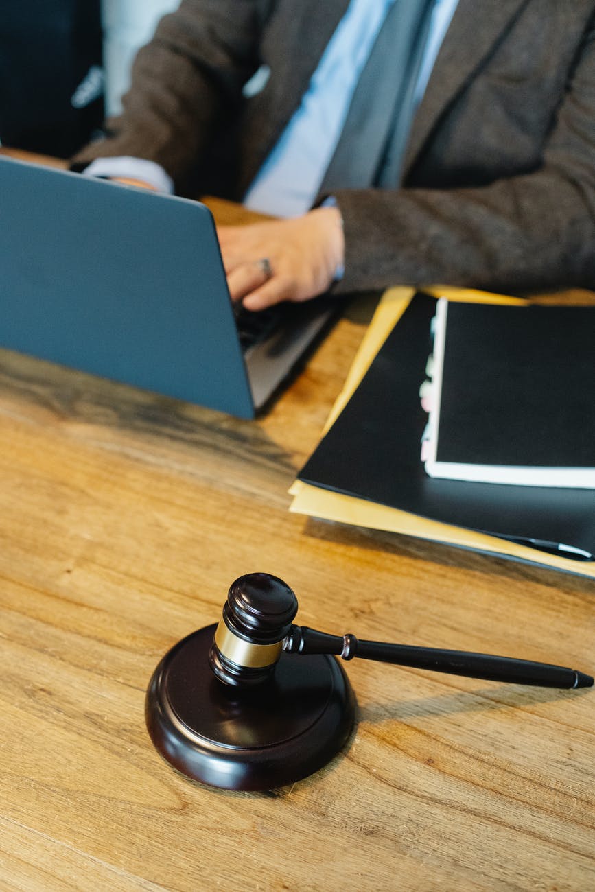 wooden gavel on wooden surface